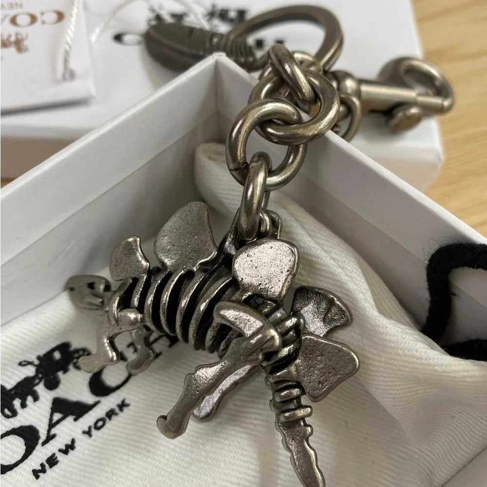Coach Silver-Tone Stegosaurus & Feather Keyring Charm